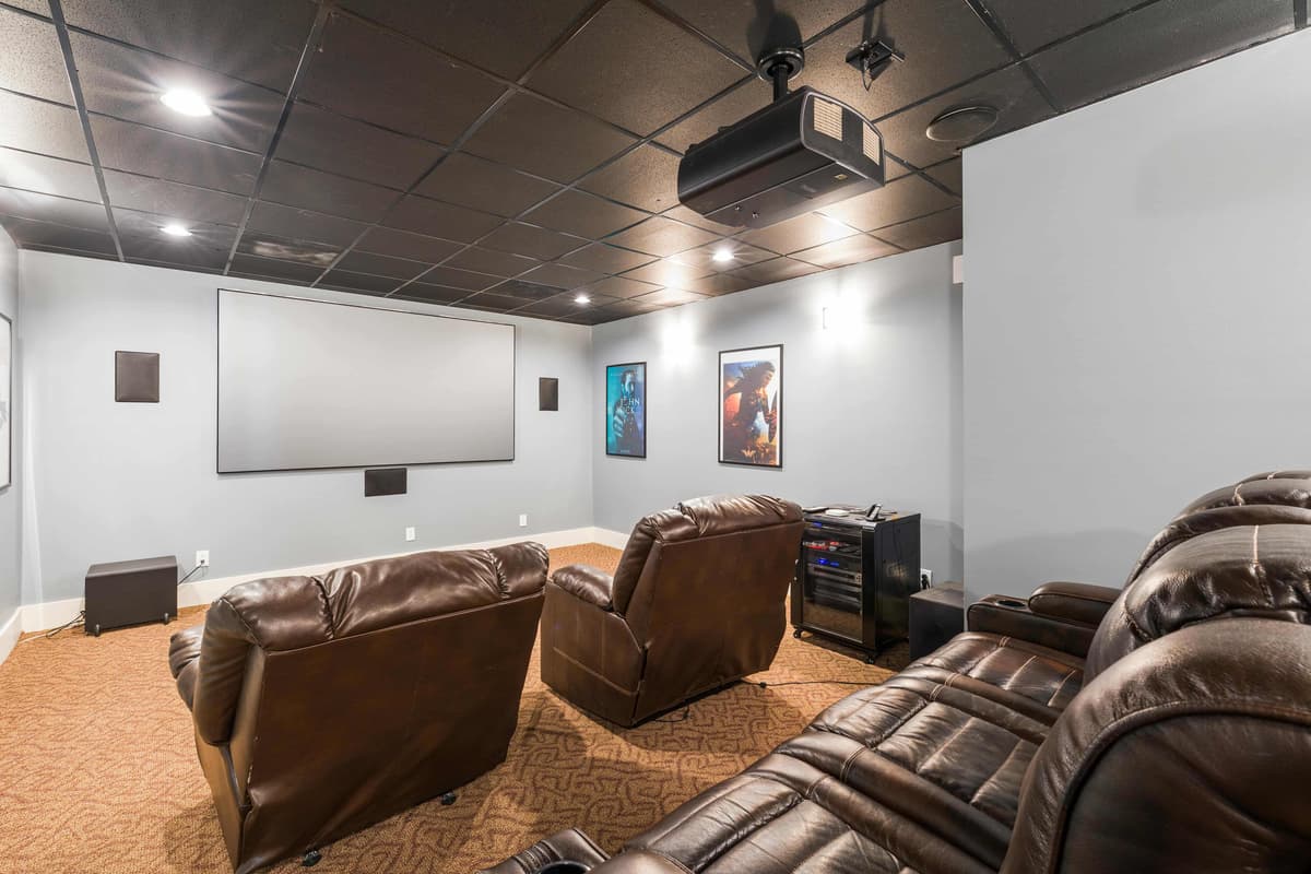 Home theatre system with a projector and surround sound speakers