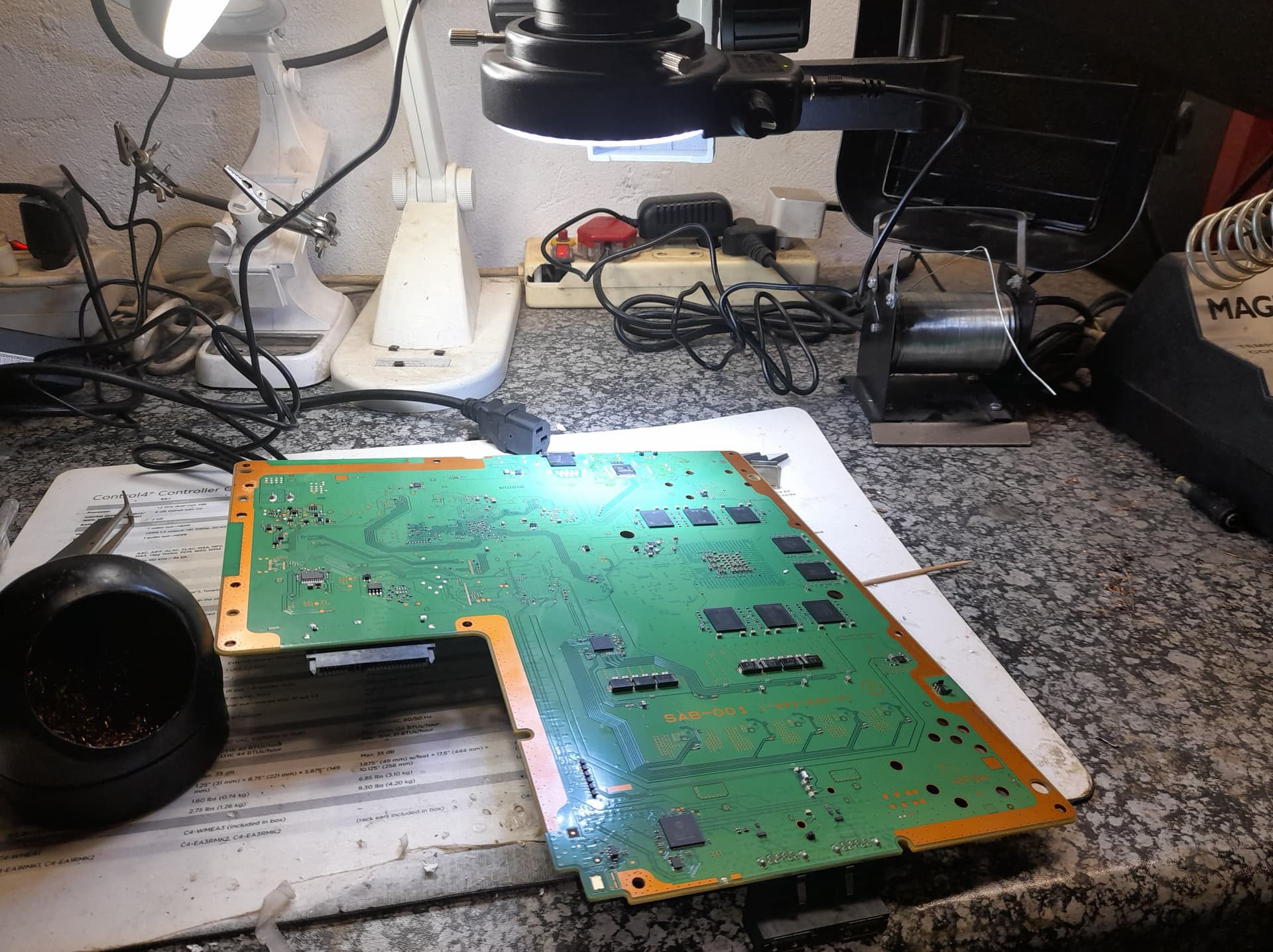 technician-performing-electronics-assessment