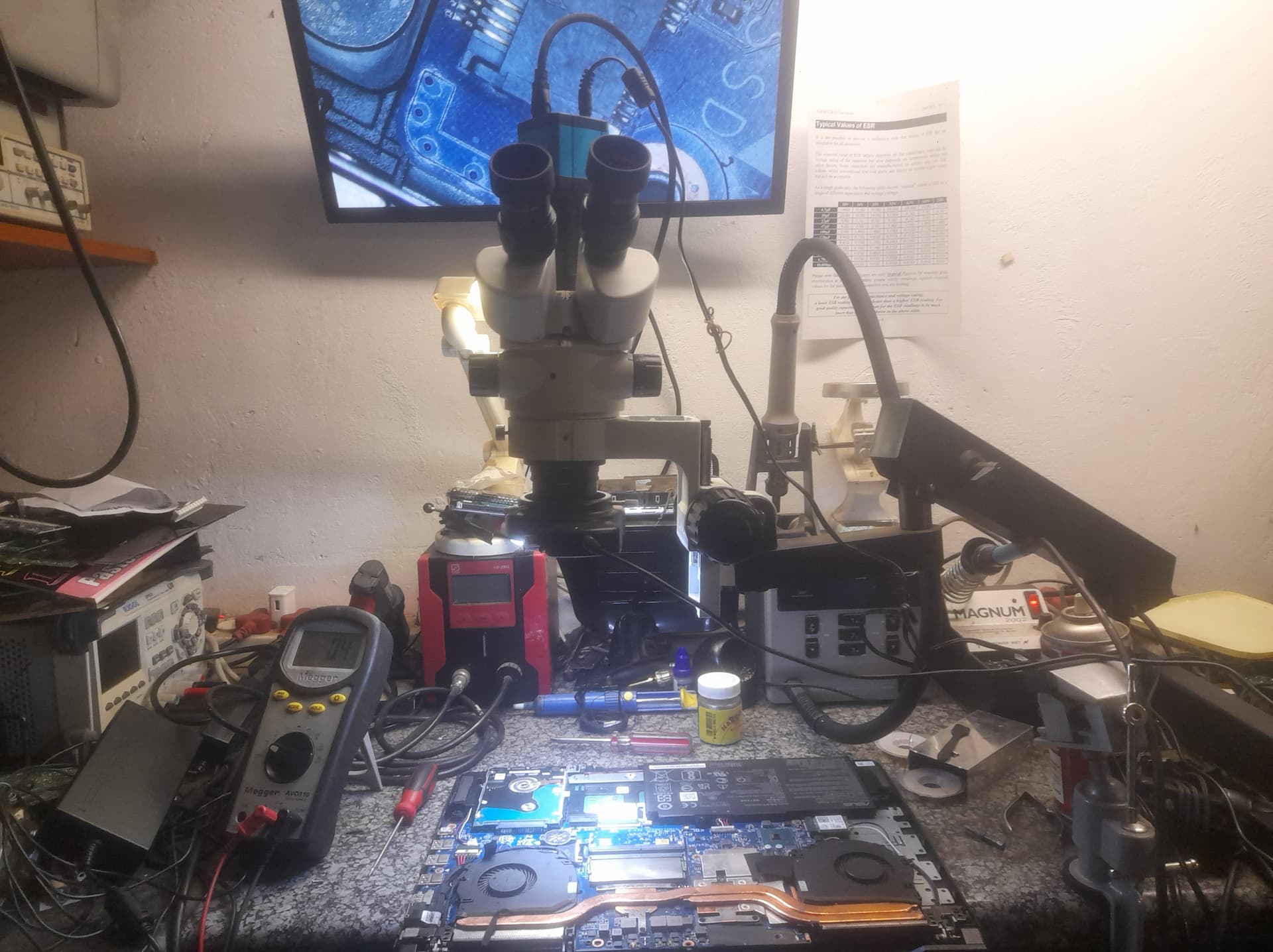 technician-performing-electronics-assessment