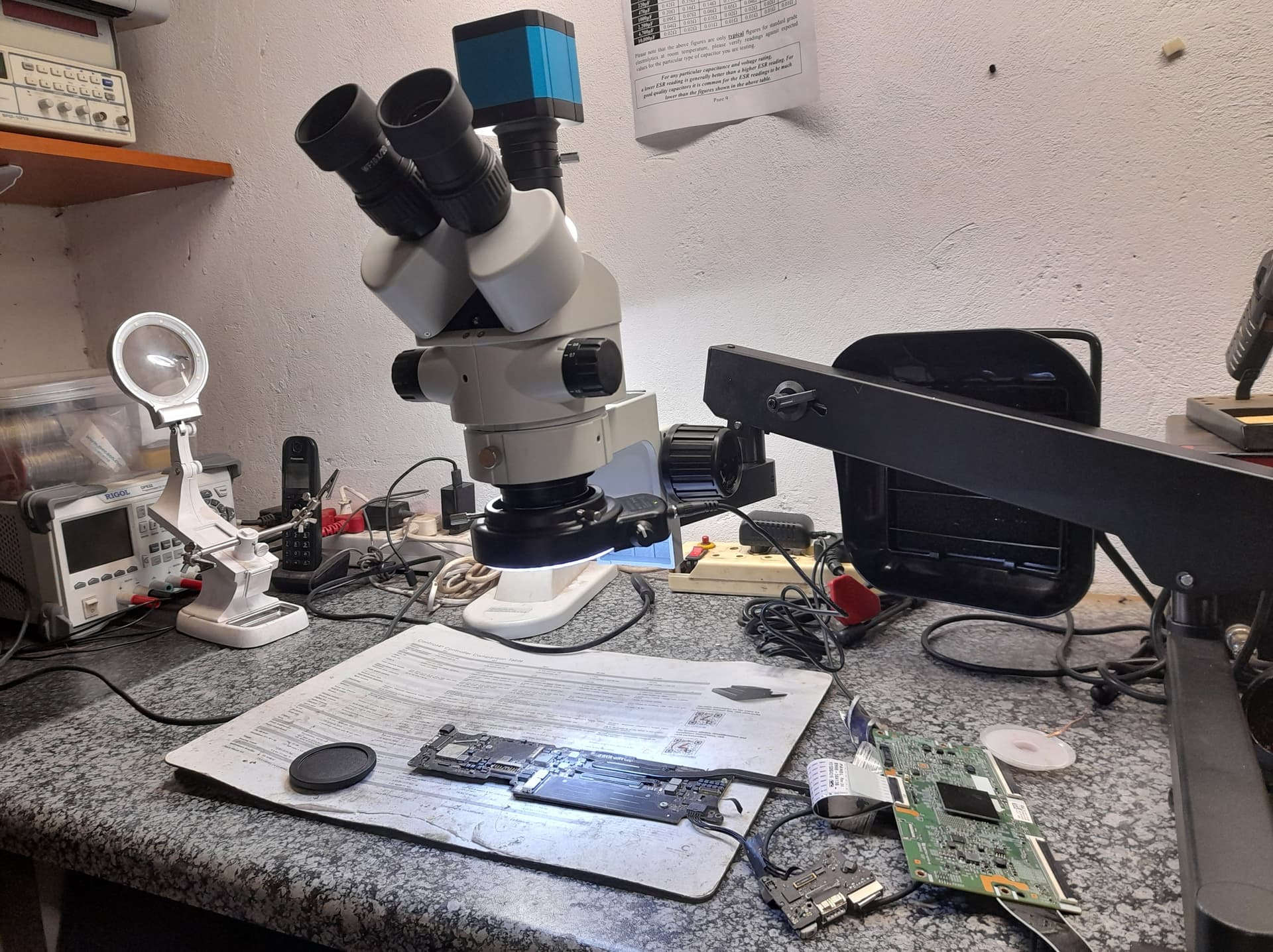 technician-performing-electronics-assessment